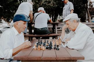 Two seniors playing chess